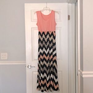 Brand new, never worn, maxi dress. Size large. Peach, black, gray, white.